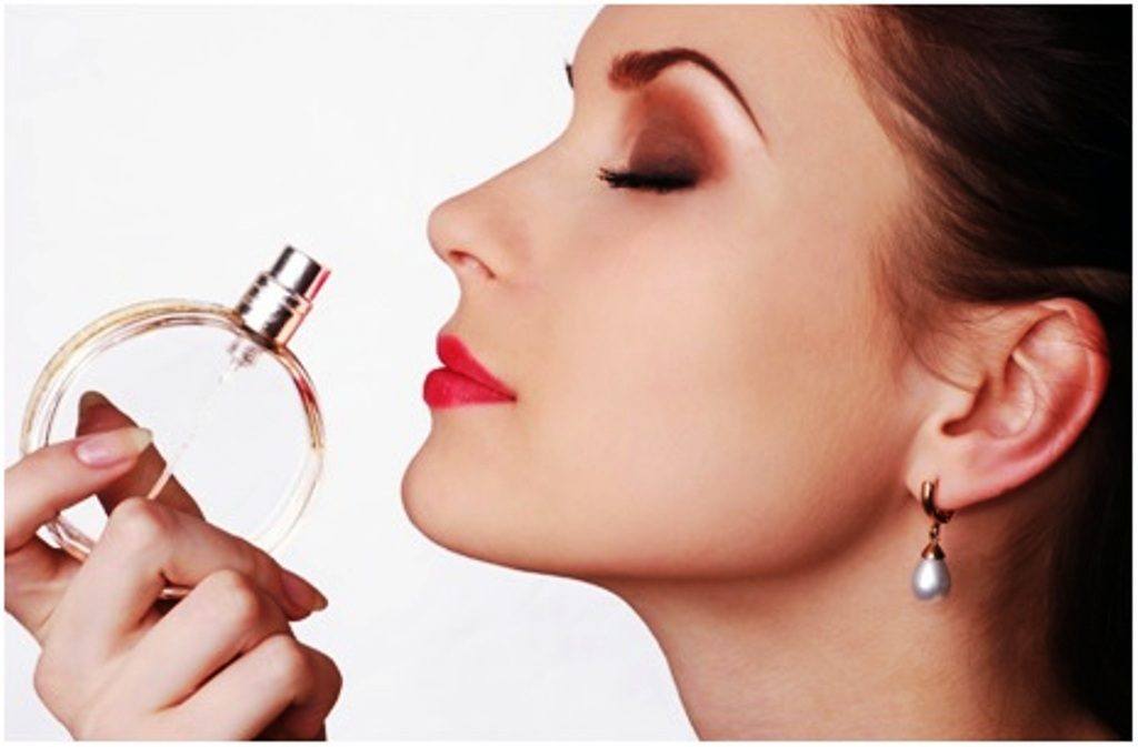 woman-smelling-perfume